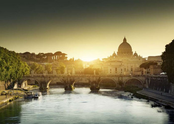 Sonnenuntergang hinter Tiber, Engelsbrücke und Peterskirche