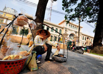Straßenhändlerin in Saigon