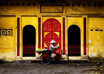 Straßenszene mit Fahrrad in Vietnam