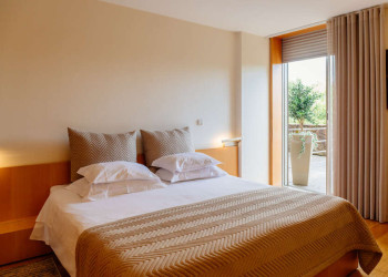 Schlafzimmer mit Balkon